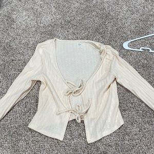 a cute beige tie up shirt